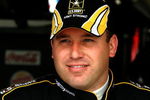 DOVER, DE - MAY 29:  Ryan Newman, driver of the #39 U.S Army Chevrolet, stands in the garage during practice for the NASCAR Sprint Cup Series Autism Speaks 400 at Dover International Speedway on May 29, 2009 in Dover, Delaware.  (Photo by Jerry Markland/Getty Images for NASCAR)
