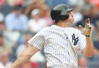 NEW YORK - MAY 24:  Mark Teixeira #25 of the New York Yankees at bat against the Philadelphia Phillies on May 24, 2009 at Yankee Stadium in the Bronx borough of New York City.  (Photo by Nick Laham/Getty Images)