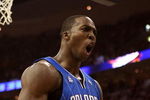 CLEVELAND - MAY 28:  Dwight Howard #12 of the Orlando Magic reacts after a play against the Cleveland Cavaliers in Game Five of the Eastern Conference Finals during the 2009 Playoffs at Quicken Loans Arena on May 28, 2009 in Cleveland, Ohio. NOTE TO USER: User expressly acknowledges and agrees that, by downloading and or using this photograph, User is consenting to the terms and conditions of the Getty Images License Agreement  (Photo by Elsa/Getty Images)