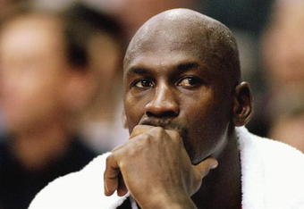 21 Nov 1997:  Guard Michael Jordan of the Chicago Bulls looks on during a game against the Los Angeles Clippers at the Los Angeles Sports Arena in Los Angeles, California.  The Bulls won the game 111-102 in double-overtime. Mandatory Credit: Todd Warshaw