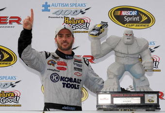 DOVER, DE - MAY 31:  Jimmie Johnson, driver of the #48 Lowe's Chevrolet, poses in victory lane after winning the NASCAR Sprint Cup Series Autism Speaks 400 at Dover International Speedway on May 31, 2009 in Dover, Delaware.  (Photo by Jason Smith/Getty Images for NASCAR)