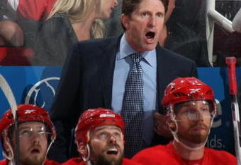 DETROIT - MAY 30:  Head coach Mike Babcock of the Detroit Red Wings yells to his team against the Pittsburgh Penguins during Game 1 of the 2009 Stanley Cup Finals at Joe Louis Arena on May 30, 2009 in Detroit, Michigan.  (Photo by Bruce Bennett/Getty Images)