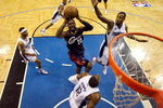 ORLANDO, FL - MAY 30: LeBron James #23 of the Cleveland Cavaliers drives to the hoop against Dwight Howard #12 and Rashard Lewis #9 of the Orlando Magic in Game Six of the Eastern Conference Finals during the 2009 Playoffs at Amway Arena on May 30, 2009 in Orlando, Florida. NOTE TO USER: User expressly acknowledges and agrees that, by downloading and or using this photograph, User is consenting to the terms and conditions of the Getty Images License Agreement  (Photo by Scott Audette-Pool/Getty Images)