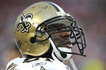 TAMPA, FL - NOVEMBER 30: Linebacker Jonathan Vilma #51 of the New Orleans Saints checks the scoreboard against the Tampa Bay Buccaneers at Raymond James Stadium on November 30, 2008 in Tampa, Florida.  (Photo by Al Messerschmidt/Getty Images) 