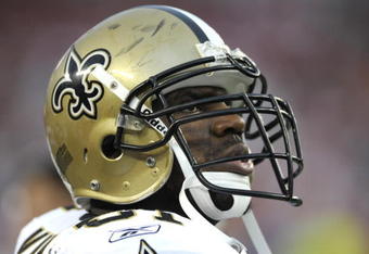 TAMPA, FL - NOVEMBER 30: Linebacker Jonathan Vilma #51 of the New Orleans Saints checks the scoreboard against the Tampa Bay Buccaneers at Raymond James Stadium on November 30, 2008 in Tampa, Florida.  (Photo by Al Messerschmidt/Getty Images) 