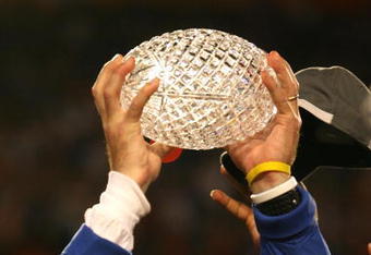 MIAMI - JANUARY 08:  Head coach Urban Meyer of the Florida Gators celebrates with the National Championship trophy after their 24-14 win against the Oklahoma Sooners during the FedEx BCS National Championship game at Dolphin Stadium on January 8, 2009 in Miami, Florida.  (Photo by Marc Serota/Getty Images)