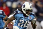 NASHVILLE, TN - JANUARY 10:  Running back Chris Johnson #28 of the Tennessee Titans runs the ball in the first quarter against the Baltimore Ravens during the AFC Divisional Playoff Game on January 10, 2009 at LP Field in Nashville, Tennessee.  (Photo by Andy Lyons/Getty Images)
