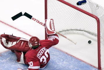 23 Apr 2001:  Goaltender Chris Osgood #30 of the Detroit Red Wings can''t stop the winning goal in overtime by Adam Deadmarsh #28 of the Los Angeles Kings in Game Six of the NHL Western Conference playoff quarterfinals at Staples Center in Los Angeles, California. DIGITAL IMAGE. Mandatory Credit: Donald Miralle/ALLSPORT