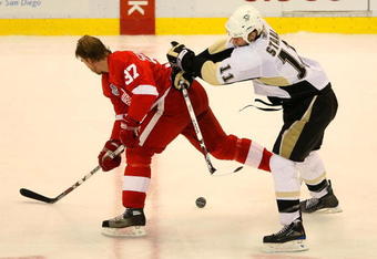 DETROIT - MAY 31:  Jordan Staal #11 of the Pittsburgh Penguins battles for the puck against Mikael Samuelsson #37 of the Detroit Red Wings during Game Two of the 2009 Stanley Cup Finals at Joe Louis Arena on May 31, 2009 in Detroit, Michigan.  (Photo by Bruce Bennett/Getty Images)