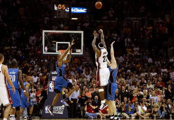 CLEVELAND - MAY 22:  LeBron James #23 of the Cleveland Cavaliers shoots the game winning three pointer over Hedo Turkoglu #15 of the Orlando Magic in Game Two of the Eastern Conference Finals during the 2009 Playoffs at Quicken Loans Arena on May 22, 2009 in Cleveland, Ohio. NOTE TO USER: User expressly acknowledges and agrees that, by downloading and or using this photograph, User is consenting to the terms and conditions of the Getty Images License Agreement  (Photo by Gregory Shamus/Getty Images)