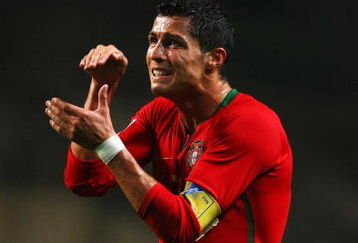 BRAGA, PORTUGAL - OCTOBER 15:  Cristiano Ronaldo of Portugal gestures after blasting a free kick over the bar during the FIFA2010 Group One World Cup Qualifying match between Portugal and Albania at the Estadio Municipal de Braga on October 15, 2008 in Braga, Portugal.  (Photo by Clive Rose/Getty Images)