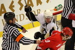 DETROIT - MAY 31:  Referee Marc Joannette tries to break up a fight between Evgeni Malkin #71 of the Pittsburgh Penguins fights and Henrik Zetterberg #40 of the Detroit Red Wings as their teams fight in the background towards the end of Game Two of the 2009 Stanley Cup Finals at Joe Louis Arena on May 31, 2009 in Detroit, Michigan.  (Photo by Claus Andersen/Getty Images)