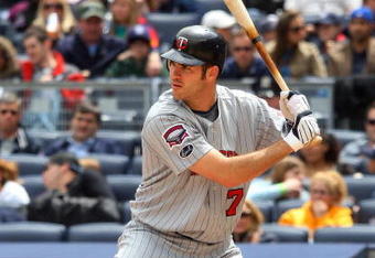 NEW YORK - MAY 17:  Joe Mauer #7 of the Minnesota Twins bats against the New York Yankees on May 17, 2009 at Yankee Stadium in the Bronx borough of New York City. The Yankees defeated the Twins 3-2 in ten innings.  (Photo by Jim McIsaac/Getty Images)