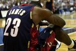 ORLANDO, FL - MAY 30: LeBron James #23 of the Cleveland Cavaliers sits on the court after being fouled by the Orlando Magic in Game Six of the Eastern Conference Finals during the 2009 Playoffs at Amway Arena on May 30, 2009 in Orlando, Florida. NOTE TO USER: User expressly acknowledges and agrees that, by downloading and or using this photograph, User is consenting to the terms and conditions of the Getty Images License Agreement  (Photo by Elsa/Getty Images)