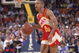INGLEWOOD, CA - 1989: Spud Webb #4 of the Atlanta Hawks dribbles the ball during a NBA game against the Los Angeles Lakers at the Great Western Forum in Inglewood, California in 1989. (Photo by Ken Levine/Getty Images)