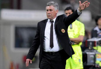 MILAN, ITALY - MARCH 10:  Manager of AC Milan Carlo Ancelotti reacts during the Serie A match between FC Juventus and  AC Milan at the Meazza Stadium on May 10, 2009 in Milan, Italy. (Photo by New Press/Getty Images)