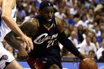 ORLANDO, FL - MAY 30:  LeBron James #23 of the Cleveland Cavaliers drives to the hoop against Hedo Turkoglu #15 of the Orlando Magic in Game Six of the Eastern Conference Finals during the 2009 Playoffs at Amway Arena on May 30, 2009 in Orlando, Florida. NOTE TO USER: User expressly acknowledges and agrees that, by downloading and or using this photograph, User is consenting to the terms and conditions of the Getty Images License Agreement  (Photo by Elsa/Getty Images)