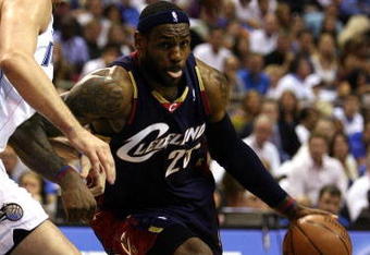 ORLANDO, FL - MAY 30:  LeBron James #23 of the Cleveland Cavaliers drives to the hoop against Hedo Turkoglu #15 of the Orlando Magic in Game Six of the Eastern Conference Finals during the 2009 Playoffs at Amway Arena on May 30, 2009 in Orlando, Florida. NOTE TO USER: User expressly acknowledges and agrees that, by downloading and or using this photograph, User is consenting to the terms and conditions of the Getty Images License Agreement  (Photo by Elsa/Getty Images)