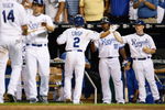 KANSAS CITY - MAY 14: Coco Crisp #2 Kansas City Royals celebrates with teammates during the game between the Baltimore Orioles on May 14, 2009 at Kauffman Stadium in Kansas City, Missouri. (Photo by: Jamie Squire/Getty Images)