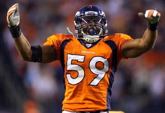 DENVER - DECEMBER 7: Linebacker Wesley Woodyard #59 of the Denver Broncos celebrates and fires up the fans against the Kansas City Chiefs during the fourth quarter of week 14 NFL action at Invesco Field at Mile High on December 7, 2008 in Denver, Colorado. Denver beat Kansas City 24-17.  (Photo by Marc Piscotty/Getty Images)