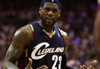 ORLANDO, FL - MAY 30:  LeBron James #23 of the Cleveland Cavaliers reacts after a play against the Orlando Magic in Game Six of the Eastern Conference Finals during the 2009 Playoffs at Amway Arena on May 30, 2009 in Orlando, Florida. NOTE TO USER: User expressly acknowledges and agrees that, by downloading and or using this photograph, User is consenting to the terms and conditions of the Getty Images License Agreement  (Photo by Elsa/Getty Images)