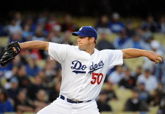 LOS ANGELES, CA - APRIL 16:  Eric Stults #50 of the Los Angeles Dodgers pitches against the San Francisco Giants during the game at Dodger Stadium on April 16, 2009 in Los Angeles, California.  (Photo by Harry How/Getty Images)