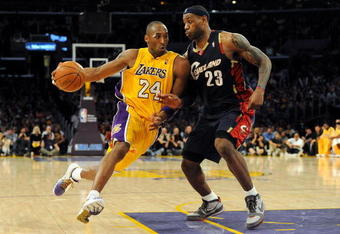 LOS ANGELES, CA - JANUARY 19:  Kobe Bryant #24 of the Los Angeles Lakers drives the ball against LeBron James #23 of the Cleveland Cavaliers during the forth quarter at Staples Center on January 19, 2009 in Los Angeles, California.  (Photo by Harry How/Getty Images)