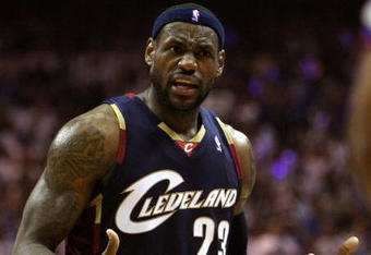 ORLANDO, FL - MAY 30:  LeBron James #23 of the Cleveland Cavaliers reacts after a play against the Orlando Magic in Game Six of the Eastern Conference Finals during the 2009 Playoffs at Amway Arena on May 30, 2009 in Orlando, Florida. NOTE TO USER: User expressly acknowledges and agrees that, by downloading and or using this photograph, User is consenting to the terms and conditions of the Getty Images License Agreement  (Photo by Elsa/Getty Images)