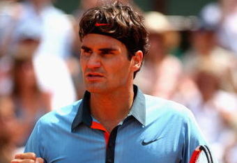 PARIS - JUNE 01:  Roger Federer of Switzerland celebrates a point during the Men's Singles Fourth Round match against Tommy Haas of Germany on day nine of the French Open at Roland Garros on June 1, 2009 in Paris, France.  (Photo by Ryan Pierse/Getty Images)
