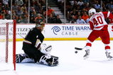 ANAHEIM, CA - MAY 12:  Goaltender Jonas Hiller #1 of the Anaheim Ducks defends the goal against Henrik Zetterberg #40 of the Detroit Red Wings during Game Six of the Western Conference Semifinal Round of the 2009 Stanley Cup Playoffs at the Honda Center on May 12, 2009 in Anaheim, California. (Photo by Jeff Gross/Getty Images)