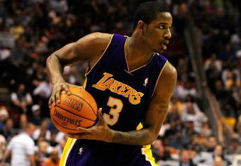 ORLANDO, FL - DECEMBER 20:  Trevor Ariza #3 of the Los Angeles Lakers looks to pass in a game against the Orlando Magic on December 20, 2008 at Amway Arena in Orlando, Florida.  NOTE TO USER: User expressly acknowledges and agrees that, by downloading and/or using this Photograph, user is consenting to the terms and conditions of the Getty Images License Agreement.  (Photo by Sam Greenwood/Getty Images)