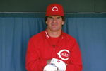 1986:  Pete Rose of the Cincinnati Reds sits in the dug-out during a MLB game in the 1986 season. ( Photo by: Stephen Dunn/Getty Images)