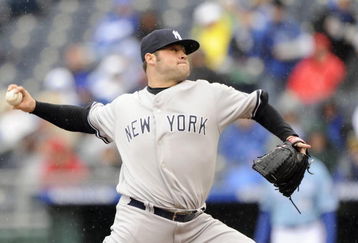 KANSAS CITY, MO - APRIL 12:  Joba Chamberlain #62 of the New York Yankees delivers the pitch against the Kansas City Royals on April 12, 2009 at Kauffman Stadium in Kansas City, Missouri. (Photo by G. Newman Lowrance/Getty Images)