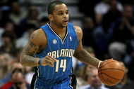 DENVER - JANUARY 17:  Jameer Nelson #14 of the Orlando Magic dribbles the ball upcourt against the Denver Nuggets during NBA action at the Pepsi Center on January 17, 2009 in Denver, Colorado. The Magic defeated the Nuggets 106-88. NOTE TO USER: User expressly acknowledges and agrees that, by downloading and or using this Photograph, user is consenting to the terms and conditions of the Getty Images License Agreement.  (Photo by Doug Pensinger/Getty Images)