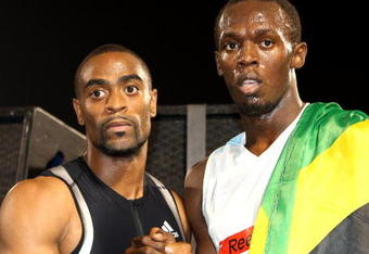 NEW YORK - MAY 31: Jamaica's Usain Bolt (R) is congratulated by Tyson Gay of USA after winning the Men's 100m at the Reebok Grand Prix at Icahn Stadium at Randalls Island Park on May 31, 2008 in New York City. Bolt set a new world record, covering the distance in 9.72 seconds. (Photo by : Victah Sailer/Getty Images)