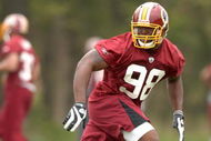 ASHBURN, VA - MAY 1:  Brian Orakpo #98, the Washington Redskins first round draft pick, runs through drills during minicamp on May 1, 2009 at Redskins Park in Ashurn, Virginia.   (Photo by Mitchell Layton/Getty Images)
