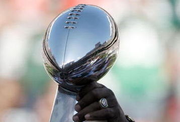 EAST RUTHERFORD, NJ - OCTOBER 26:  Members of the 1968 Jets touch the Lombardi Trophy during halftime festivities celebrating the 40th anniversary of the team's win over the Colts in Super Bowl III during the game between the Kansas City Chiefs and the New York Jets on October 26, 2008 at Giants Stadium in East Rutherford, New Jersey.  (Photo by Jarrett Baker/Getty Images)