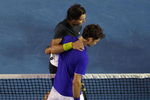 MELBOURNE, AUSTRALIA - FEBRUARY 01:  Roger Federer of Switzerland congratulates Rafael Nadal of Spain after winning his men's final match against Roger Federer of Switzerland during day fourteen of the 2009 Australian Open at Melbourne Park on  February 1, 2009 in Melbourne, Australia.  (Photo by Ezra Shaw/Getty Images)