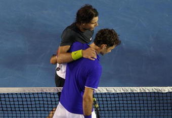 MELBOURNE, AUSTRALIA - FEBRUARY 01:  Roger Federer of Switzerland congratulates Rafael Nadal of Spain after winning his men's final match against Roger Federer of Switzerland during day fourteen of the 2009 Australian Open at Melbourne Park on  February 1, 2009 in Melbourne, Australia.  (Photo by Ezra Shaw/Getty Images)