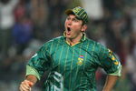 JOHANNESBURG, SOUTH AFRICA - FEBRUARY 24:  Graeme Smith of South Africa celebrates his catch to dismiss Simon Katich of Australia during the Pro 20 match between South Africa and Australia played at the Wanderers Stadium on February 24, 2006 in Johannesburg, South Africa.  (Photo by Hamish Blair/Getty Images)
