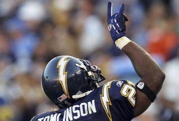 SAN DIEGO - DECEMBER 10:  LaDainian Tomlinson #21 of the San Diego Chargers celebrates after tying the NFL record for single-season touchdowns, with 28 touchdowns, against the Denver Broncos December 10, 2006 at Qualcomm Stadium in San Diego, California. Tomlinson broke the record later in the game.  (Photo by Lisa Blumenfeld/Getty Images)