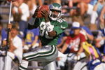 1987: Wide receiver Mike Quick #82 of the Philadelphia Eagles leaps to catch a pass down the sideline during a 1987 NFL game.  (Photo by Mike Powell/Getty Images)
