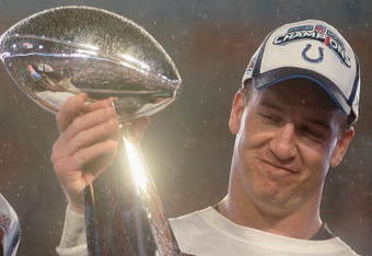 MIAMI GARDENS, FL - FEBRUARY 04:  Quarterback Peyton Manning #18 of the Indianapolis Colts smiles as he holds the Vince Lombardi Super Bowl trophy after his team won the Super Bowl XLI 29-17 over the Chicago Bears on February 4, 2007 at Dolphin Stadium in Miami Gardens, Florida.  (Photo by Donald Miralle/Getty Images)