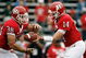 PISCATAWAY, NJ - SEPTEMBER 27: Quarterback Mike Teel #14 of the Rutgers Scarlet Knights hands off to running back Joe Martinek #38 during the first quarter against the Morgan State Bears at Rutgers Stadium on September 27, 2008 in Piscataway, New Jersey. (Photo by Jarrett Baker/Getty Images)