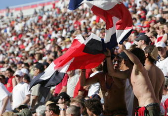 SALT LAKE CITY - JUNE 4:  Fans support the Costa Rican team during the CONCACAF World Cup qualifying match against the U.S. Men's National Team at Rice-Eccles Stadium on JUNE 4, 2005 in Salt Lake City, Utah. The USA won 3-0.  (Photo by Harry How/Getty Images)