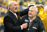 PITTSBURGH - OCTOBER 26:  Former quarterback Terry Bradshaw (L) and head coach Chuck Noll (R) of the Pittsburgh Steelers appear during a pre-game ceremony to celebrate the Steelers' 1000th game before the game against the St. Louis Rams on October 26, 2003 at Heinz Field in Pittsburgh, Pennsylvania. The Rams defeated the Steelers 33-21.  (Photo by David Maxwell/Getty Images)