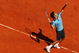 PARIS - JUNE 01:  Roger Federer of Switzerland serves during the Men's Singles Fourth Round match against Tommy Haas of Germany on day nine of the French Open at Roland Garros on June 1, 2009 in Paris, France.  (Photo by Clive Brunskill/Getty Images)