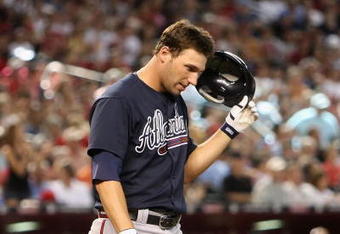 PHOENIX - MAY 30:  Jeff Francoeur #7 of the Atlanta Braves reacts after striking out against the Arizona Diamondbacks during the major league baseball game at Chase Field on May 30, 2009 in Phoenix, Arizona.The Diamondbacks defeated the Braves 3-2.  (Photo by Christian Petersen/Getty Images)
