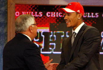 NEW YORK - JUNE 26:  NBA Commissioner David Stern shakes hands with number one draft pick for the Chicago Bulls, Derrick Rose during the 2008 NBA Draft at the Wamu Theatre at Madison Square Garden June 26, 2008 in New York City. NOTE TO USER: User expressly acknowledges and agrees that, by downloading and or using this photograph, User is consenting to the terms and conditions of the Getty Images License Agreement.  (Photo by Nick Laham/Getty Images)