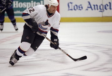 13 Mar 1999: Peter Zezel #22 of the Vancover Canucks skates on the ice during the game against the Los Angeles Kings at the Great Western Forum in Inglewood, California. The Kings defeated the Canucks 3-1. Mandatory Credit: Kellie Landis  /Allsport
